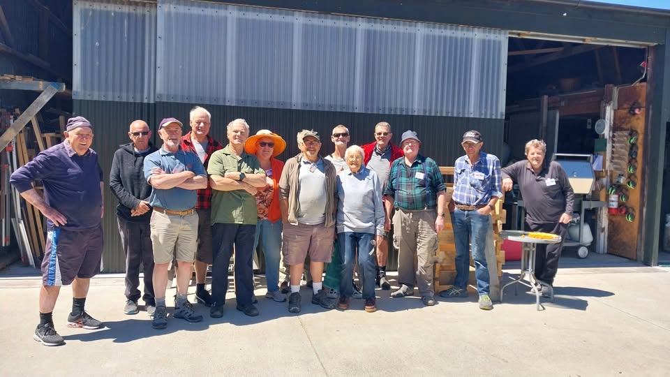 Amberley Menz Shed members outside the workshop